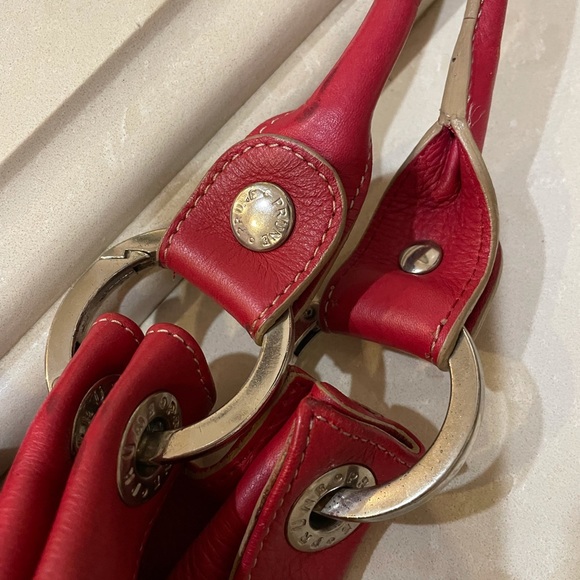 Red leather bag w/chrome/silver. Great condition. By “Prune” - Picture 2 of 4